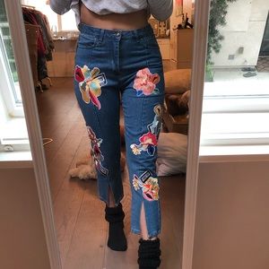 Blue jeans with colorful patches